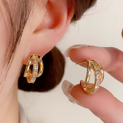 Valeria – Boucles d'oreilles Triple Anneau en Or