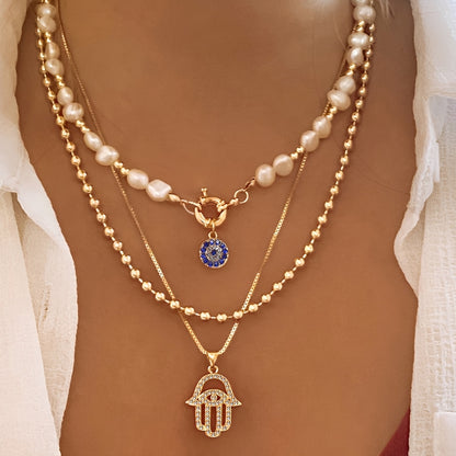 Nadia – Collier Multi-Rangs Perles & Main de Fatma