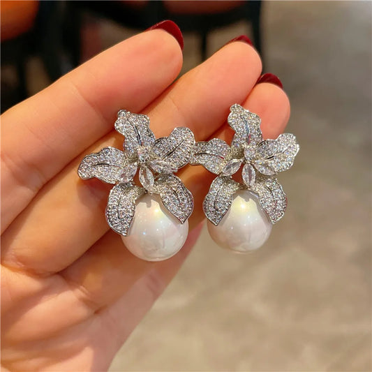 Isaline – Boucles Raffinées Fleur et Perle