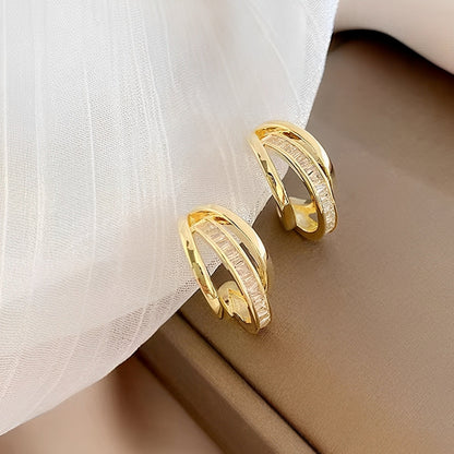 Valeria – Boucles d'oreilles Triple Anneau en Or