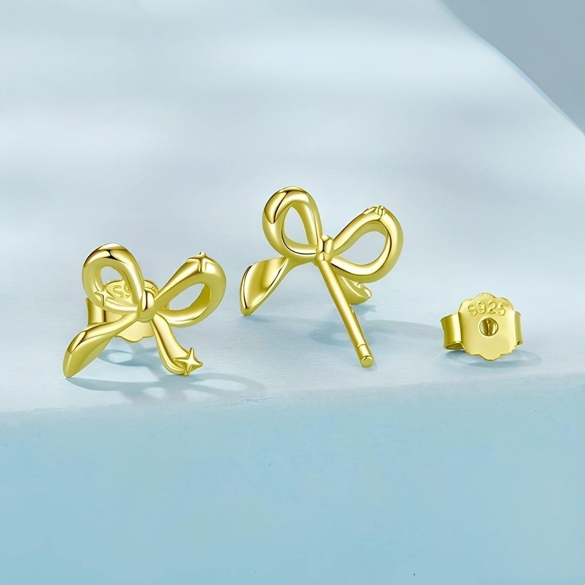 Lunea – Boucles d’Oreilles Clous Nœud Étoilé Mini