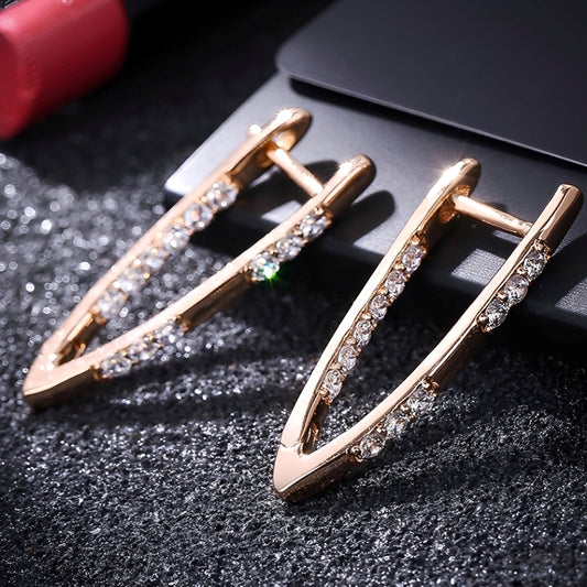 Cleah – Boucles Élégantes en Zircone Dorée