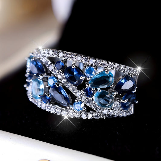 Julie – Bague Vintage avec Zircon Bleu et Détail Doré