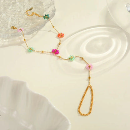 Rosalie – Bracelet Doré Fleur Perlée