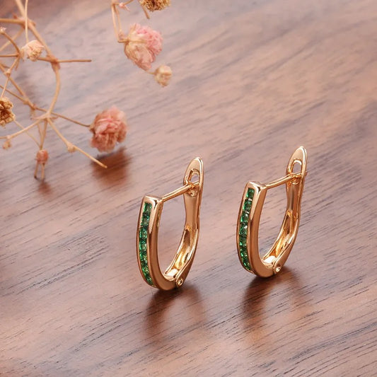 Christine – Boucles Dorées Émeraude & Diamant