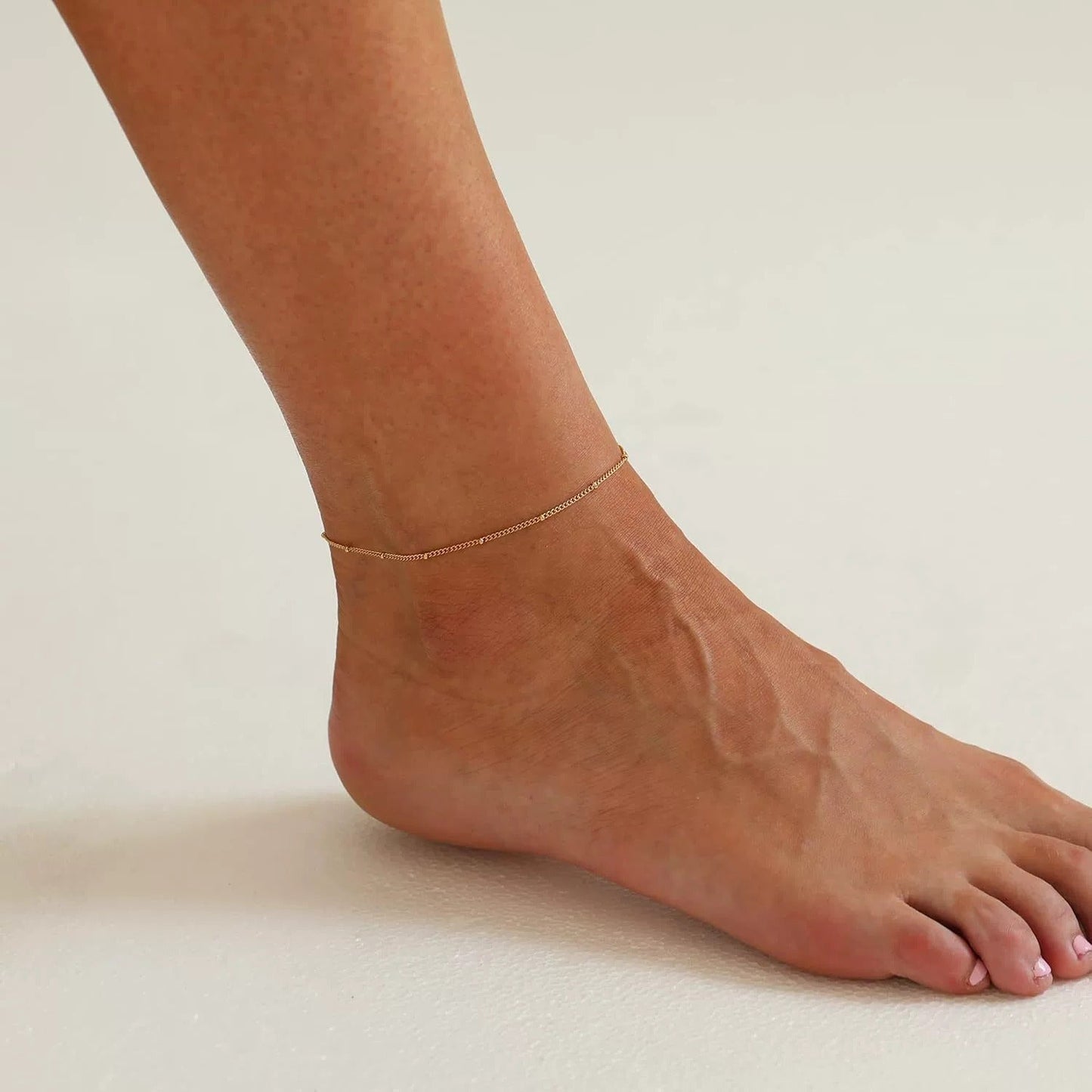 Wren – Chevillière Chaîne Dorée Élégante