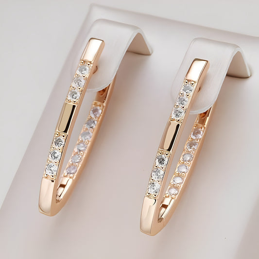 Lyssia – Boucles d’Oreilles Dorées Élégantes avec Zircon