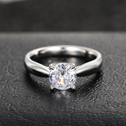 Mila – Bague Quatre Griffes Simple et Polyvalente