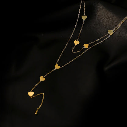 Christy – Collier Multi-Rangs Cœurs Dorés