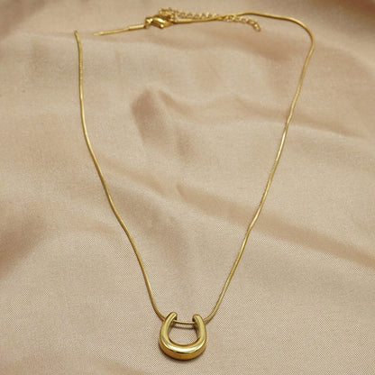 Caitlin – Collier Fer à Cheval Porte-Bonheur Doré