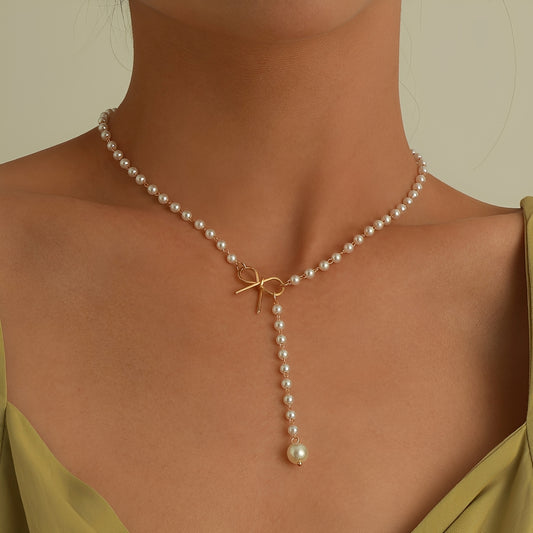 Antoneth – Collier Pendentif Nœud Papillon avec Perle