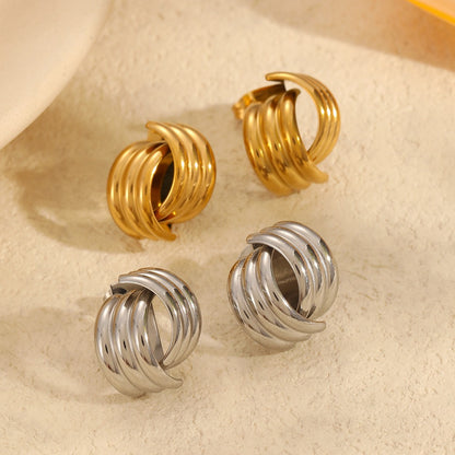 Selene – Clous d’Oreilles Croix en Acier Titane