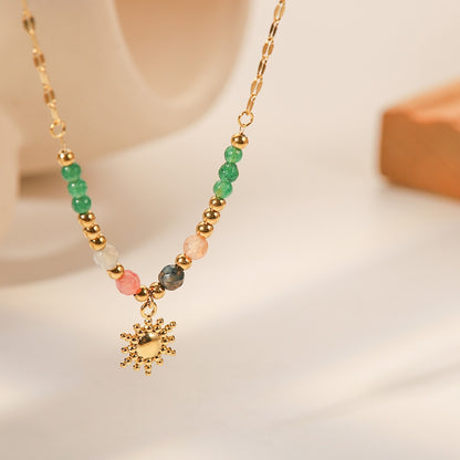Syra – Collier Soleil en Pierres Naturelles Dorées