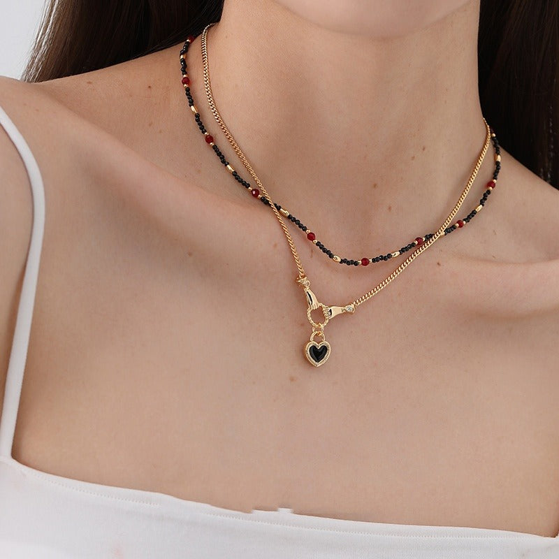 Amara – Collier Pendentif Cœur Mains
