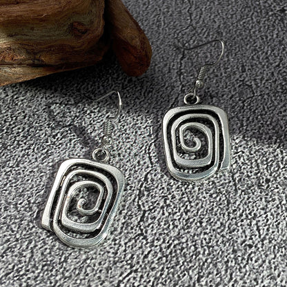 Eva – Boucles Spirales Rétro en Argent