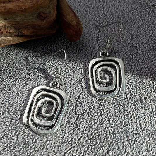 Eva – Boucles Spirales Rétro en Argent
