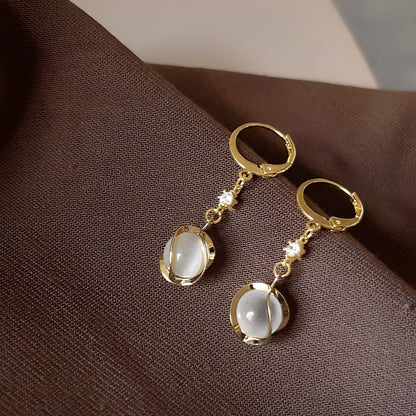Lyra – Boucles d'Oreilles avec Éclat d'Opale Blanche