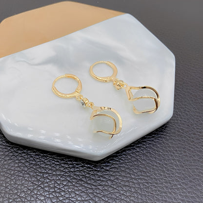 Lyra – Boucles d'Oreilles avec Éclat d'Opale Blanche