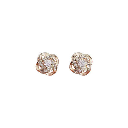 Ryoshi – Boucles d'Oreilles Croix Fleur Spirale