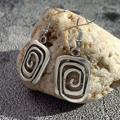 Eva – Boucles Spirales Rétro en Argent