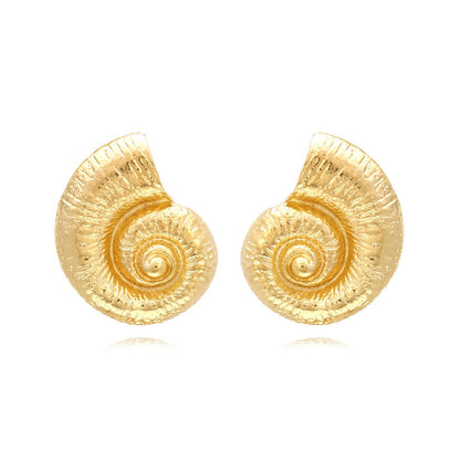 Pia – Boucles d’Oreilles Coquillage Élégantes