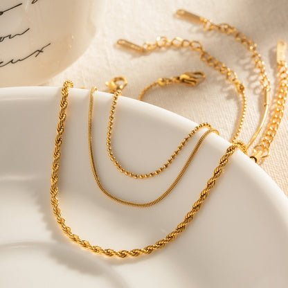 Bailey – Trio de Bracelets Fins Dorés Empilables pour Femme