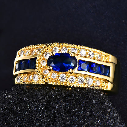 Marina – Bague Dorée avec Pierre Bleue Brillante