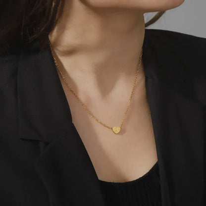 Arielle – Collier Cœur Initiale Doré