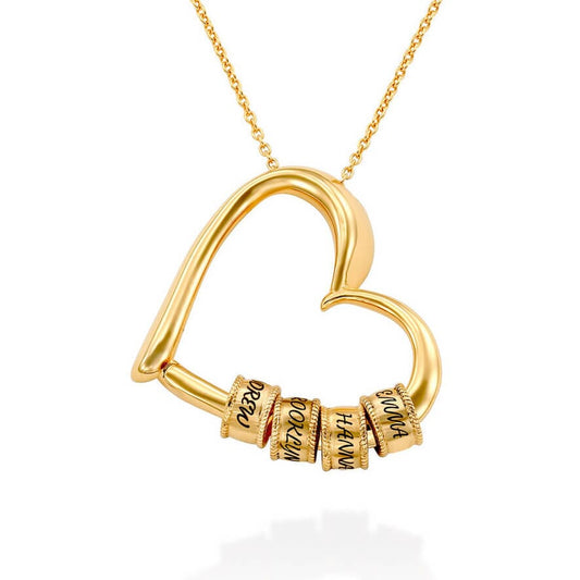 Maya – Collier Cœur avec Anneaux Gravés