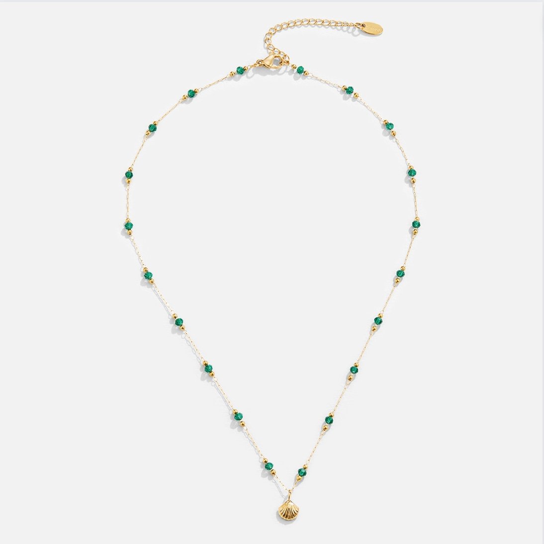 Nerissa – Collier Doré Coquillage et Perles Vertes