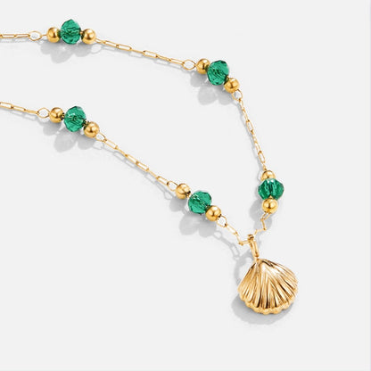 Nerissa – Collier Doré Coquillage et Perles Vertes