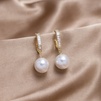 Elsa – Boucles d'Oreilles Élégantes avec Perles et Zircon